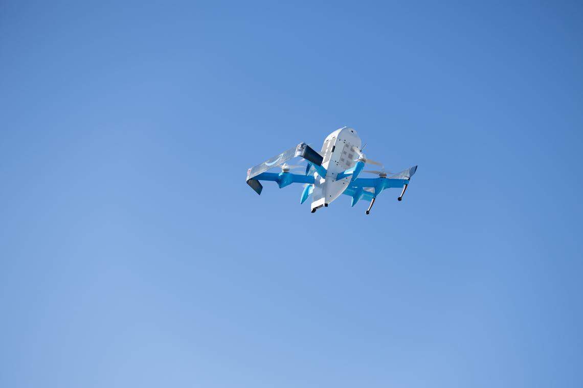 An Amazon drone takes off for a delivery.