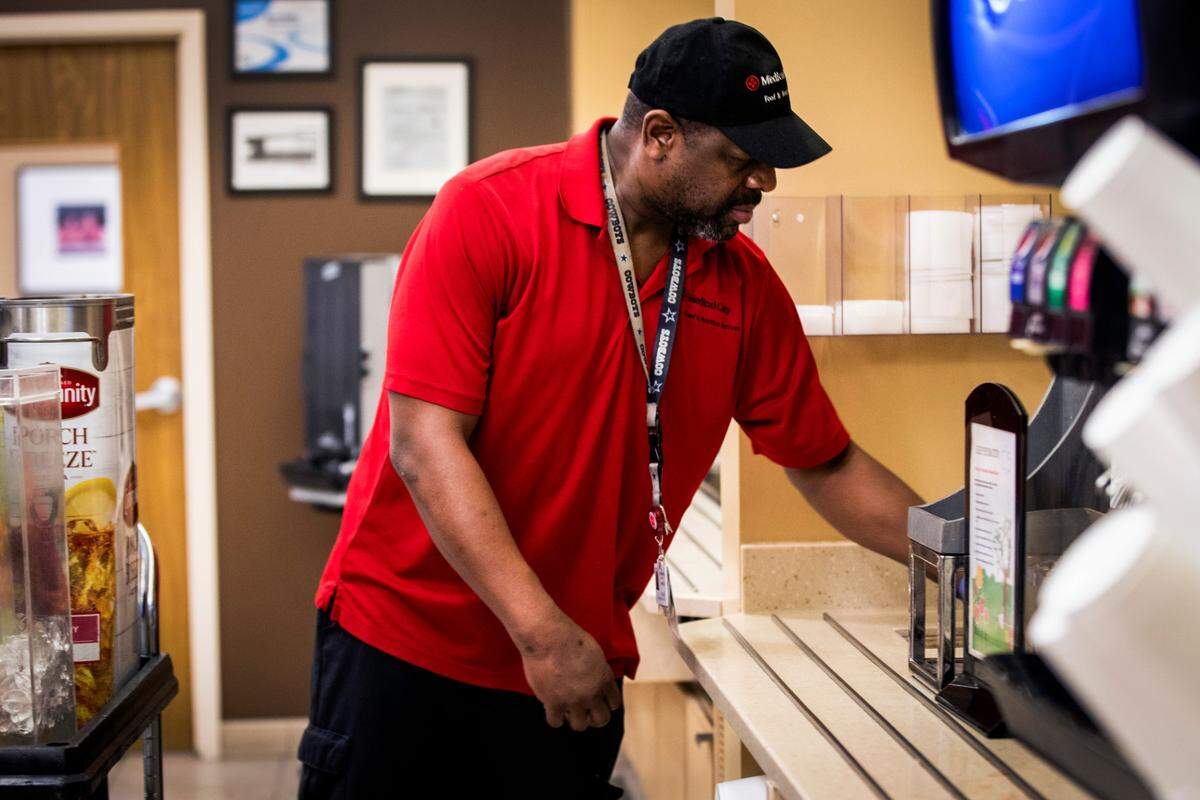 Marcus Graves, who grew up in Fort Worth’s 76104 ZIP code, cleans the counters at the end of the day at Medical City in North Richland Hills. Graves was a child when a school nurse told him he had high blood pressure. At 40, a stroke nearly killed him and left him paralyzed on the right side of his body.