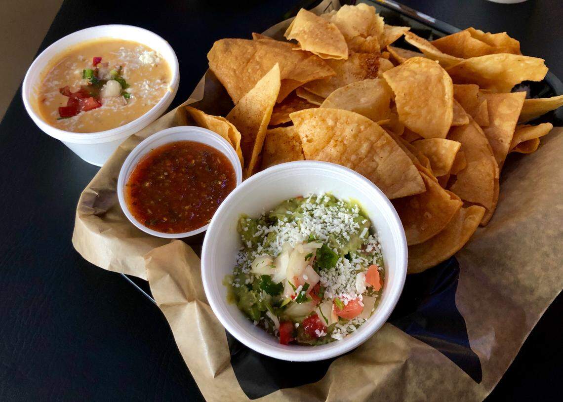 Chile powder-dusted chips with guacamole, queso and salsa at Downtown Cantina in Weatherford.