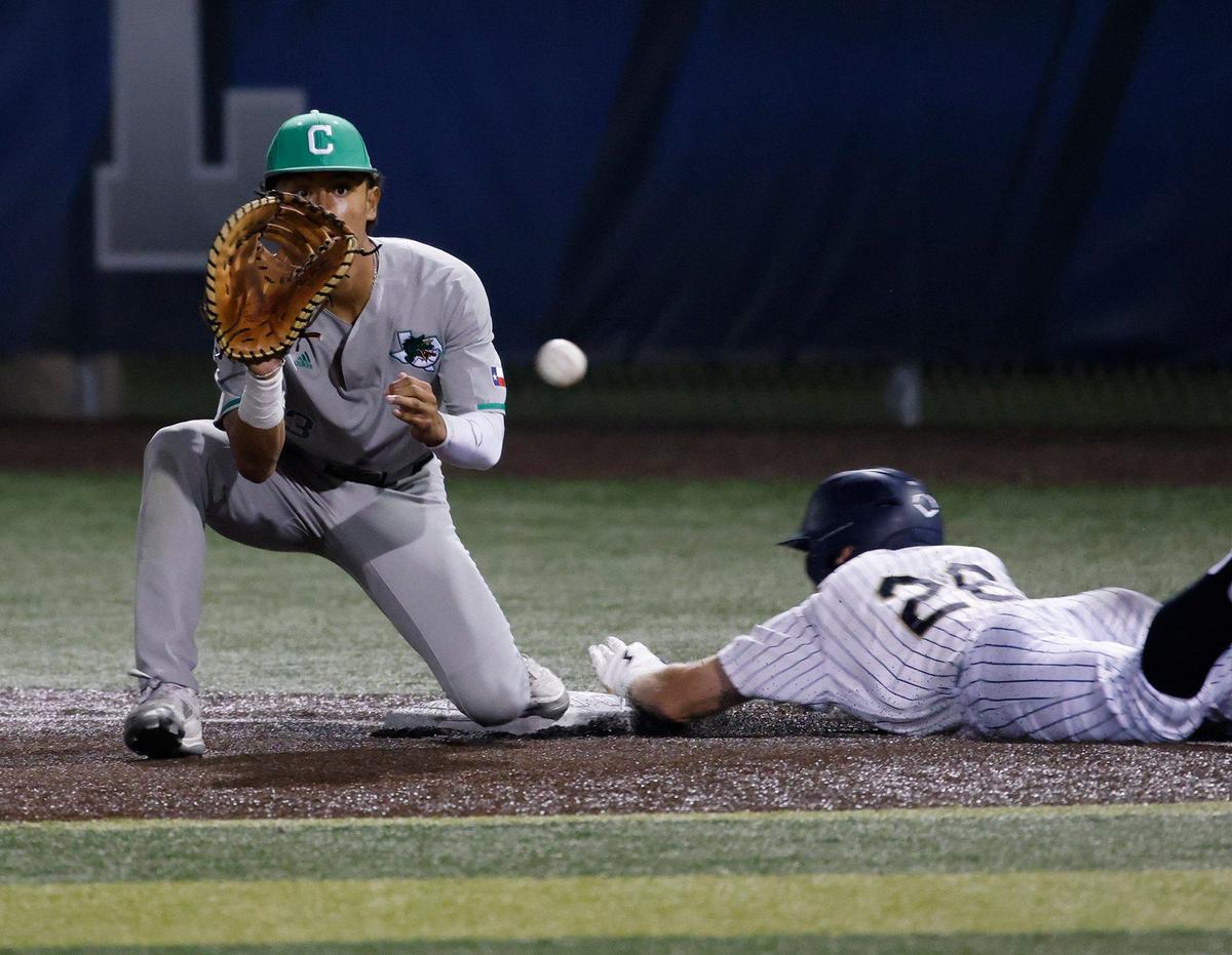 Keller center fielder Brock Burkett beats the throw to Southlake first baseman Mathias O’Donnell during a UIL District 6A Region 1 Quarterfinals baseball game at L.D. Bell in Hurst, Texas, Thursday, May 16, 2024.