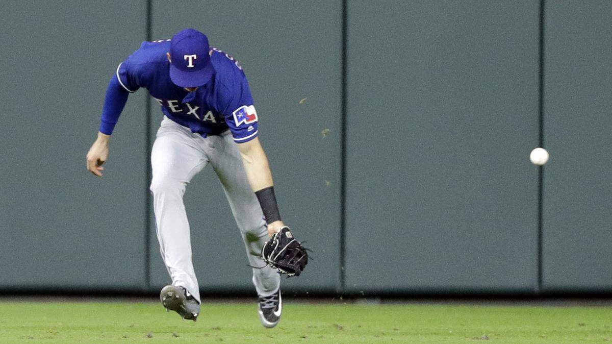 Rangers center fielder Drew Robinson misplayed a single by the Astros' Marwin Gonzalez in the eighth inning Friday night, which allowed Houston to score the go-ahead run and win 3-2 at Minute Maid Park.