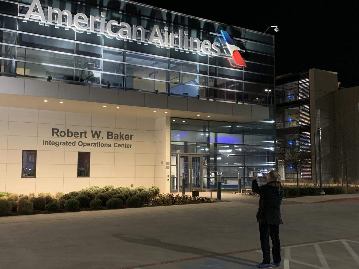 A visitor shoots a snapshot outside American Airlines’ Integrated Operations Center in Fort Worth.