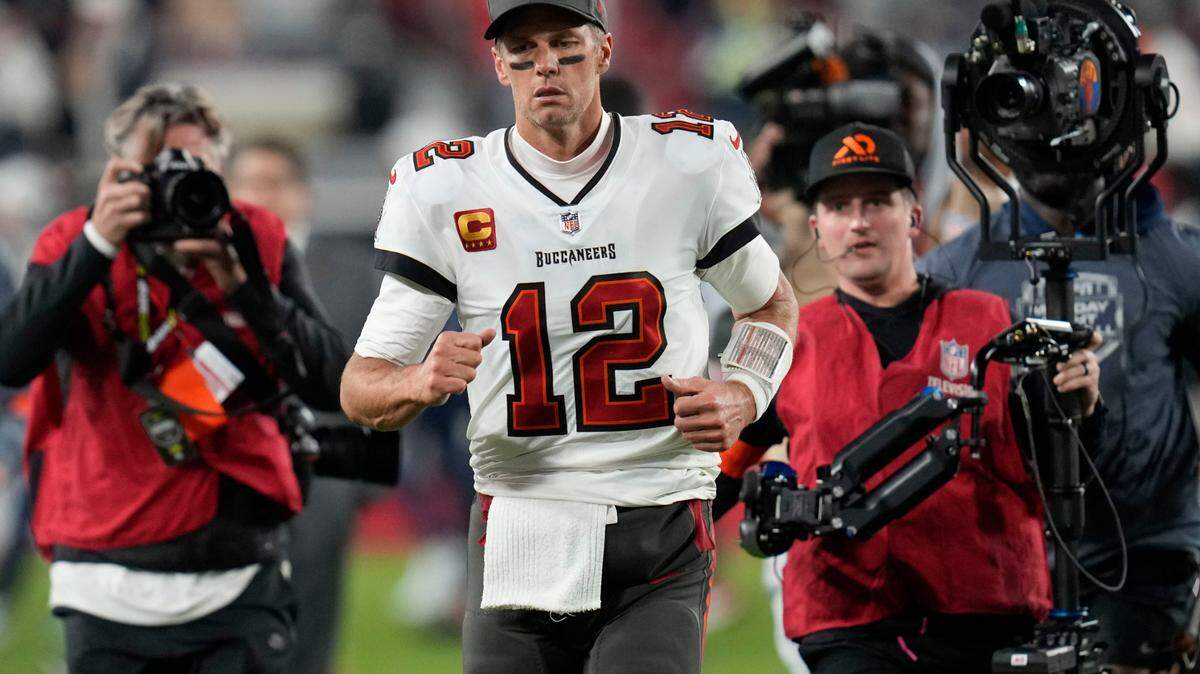 Tampa Bay Buccaneers quarterback Tom Brady (12) leaves the field after an NFL wild-card football game against the Dallas Cowboys, on Monday.