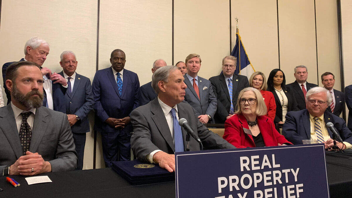 Greg Abbott signed three property tax exemption bills on June 18, 2025 in Denton County beside the three bills’ authors, Sen. Paul Bettencourt and Rep. Morgan Meyer.