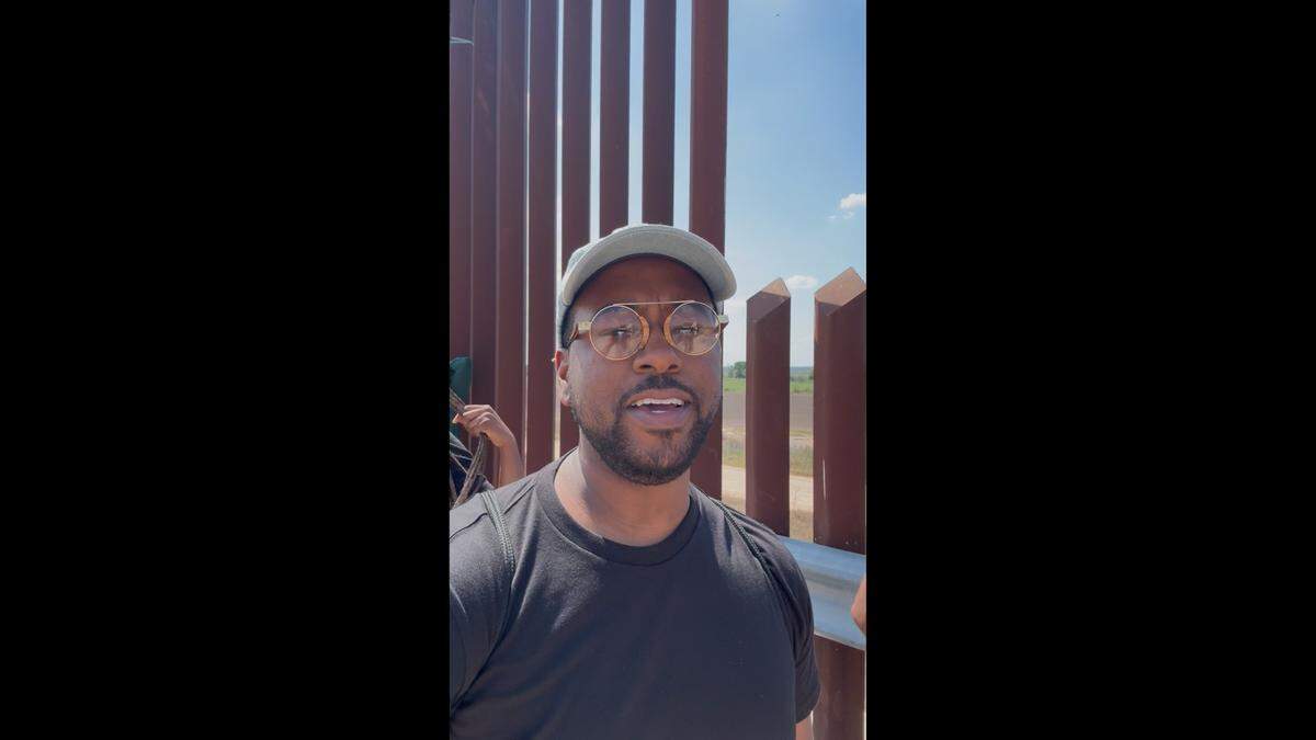 Bradford William Davis stands between the Trump and Biden administration border walls in McAllen, Texas.