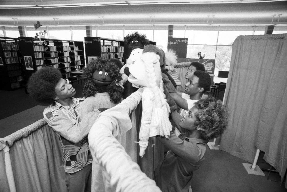 June 12, 1977: Curtis Miller, 16, at left, is shown with a puppet at Southeast Branch Library (now the East Berry branch of the Fort Worth Public Library), 4300 E. Berry St., where youths are working on a puppet show for Juneteenth at Sycamore Park and Oakbrook Mall.
