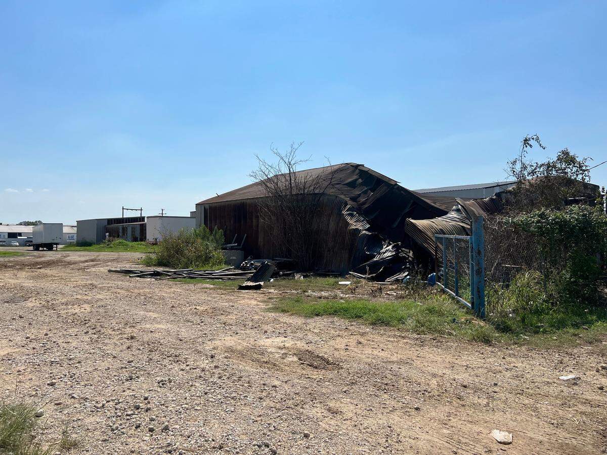 Two men were burned on their faces by a fire at a business that erupted Monday afternoon in north Fort Worth, authorities said.
