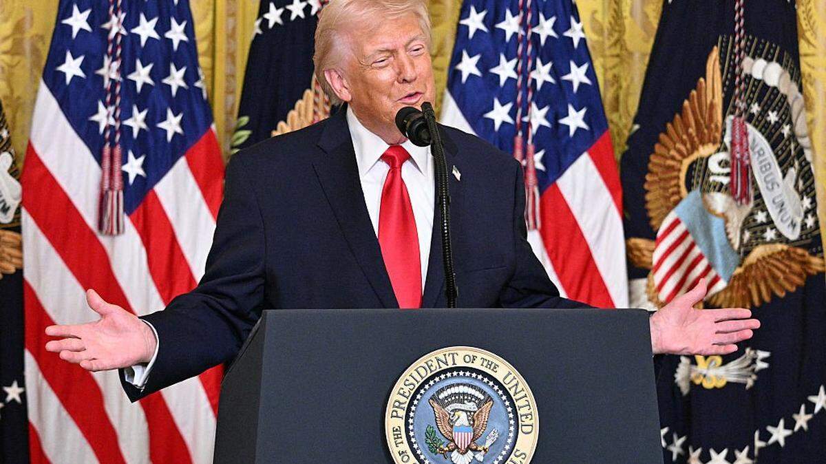 US President Donald Trump gestures as he speaks during a Women's History Month event in the East Room of the White House in Washington, DC, on March 12, 2026. (Photo by Jim WATSON / AFP via Getty Images)