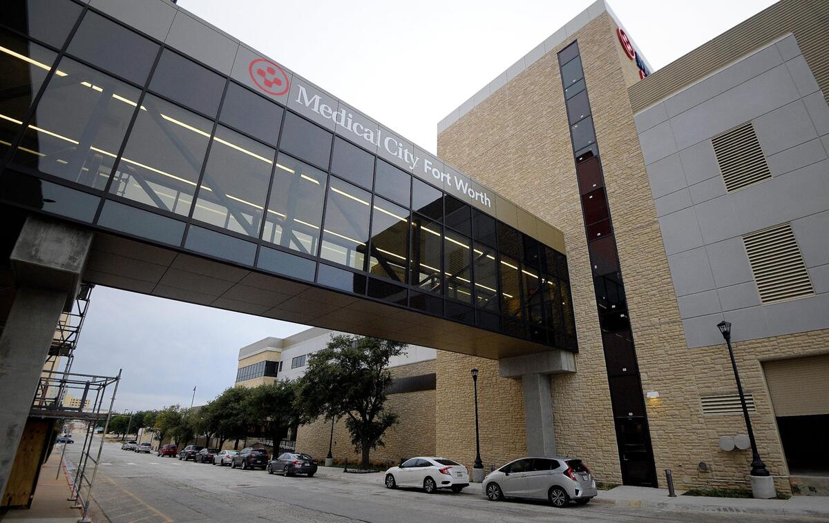 A sky-bridge connects the new Tower B, right, at Medical City Fort Worth and the existing building, left, in Fort Worth, TX, Wednesday, Dec. 12, 2018.