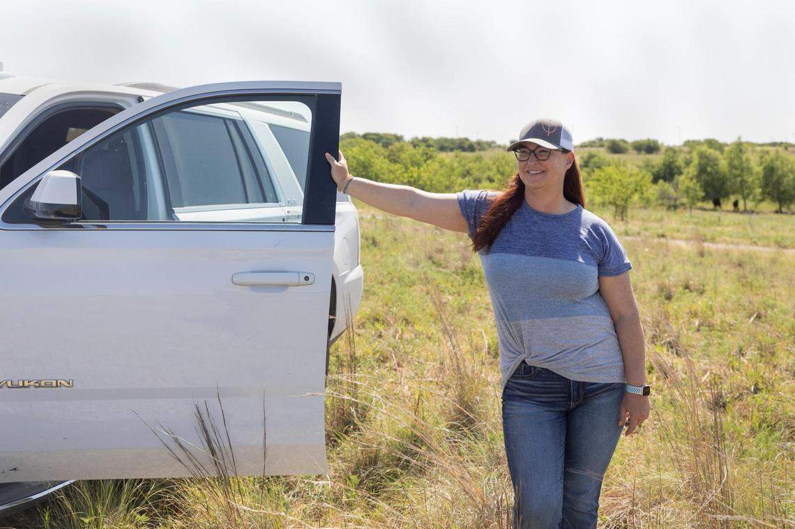 Ranch manager Missy Bonds in a cattle field at Bonds Ranch on Thursday, June 23, 2022, in Fort Worth, Texas. Bonds says the worst of the draught hasn’t arrived, but the staff is prepared for it.