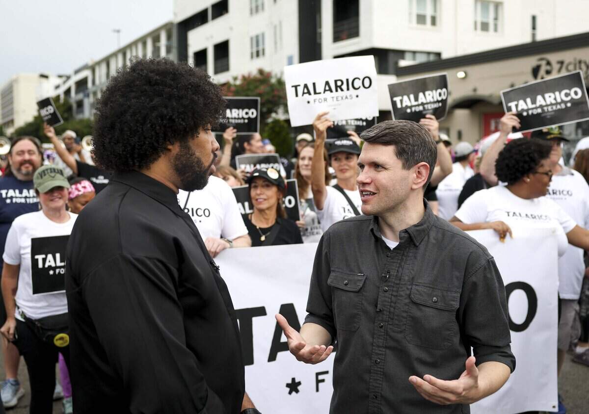 U.S. Senate candidate James Talarico speaks with journalist Eugene Daniels with MS NOW as they walk in the Opal Lee Walk for Freedom on Friday, June 19, 2026, in Fort Worth.