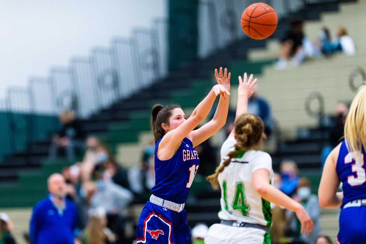 Mimi Margiotta (10) shoots a three during a district match between Lake Dallas and Grapevine at Lake Dallas High Shcool on January 29, 2021. Photo by Matt Smith (Special to the Star-Telegram).