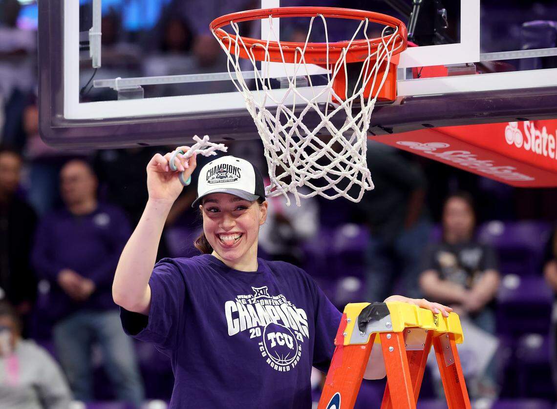 Texas Christian University forward Marta Suarez cuts a section of net to celebrate her team winning the Big 12 regular season championship on Sunday, March 1 2026, at Schollmaier Arena in Fort Worth.