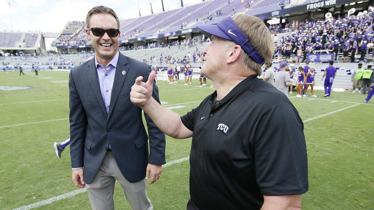 TCU athletic director Jeremiah Donati, left, is now tasked to find a replacement for football coach Gary Patterson, who “resigned” on Sunday.