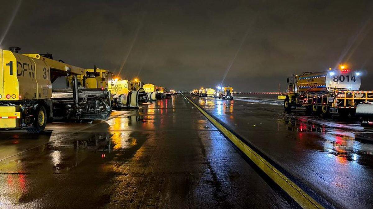 Equipment at Dallas-Fort Worth International Airport early Friday, Jan. 10, 2025, are keeping roads and runways clear of snow and ice.