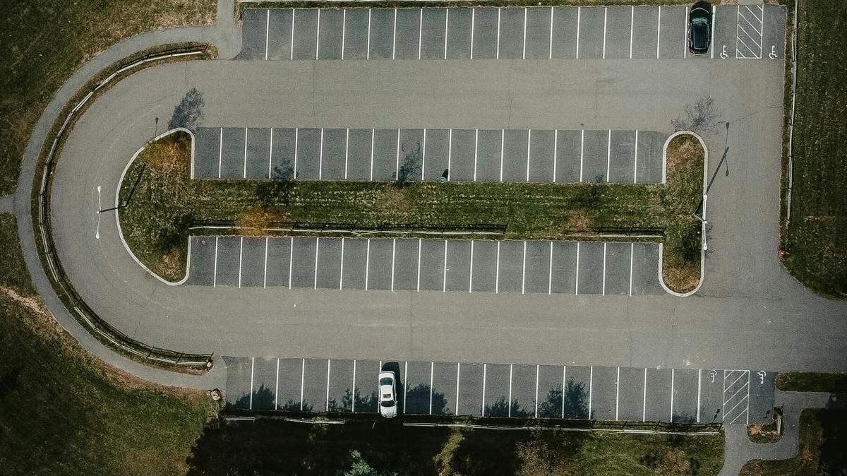 Parking spaces in Texas must be no smaller than 18 feet long and 9 feet wide. There are also other considerations for developers as there is a minimum number of parking spaces required by building code in municipalities like Fort Worth.