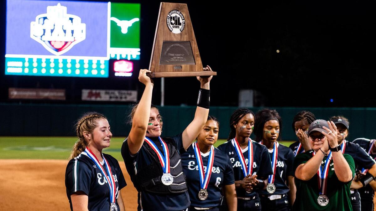 The Eagles hoist their state runner-up trophy after Lake Ridge’s loss to Northside O’Conner in the 6A UIL State Softball Final in Austin Texas, on June 4th, 2022.