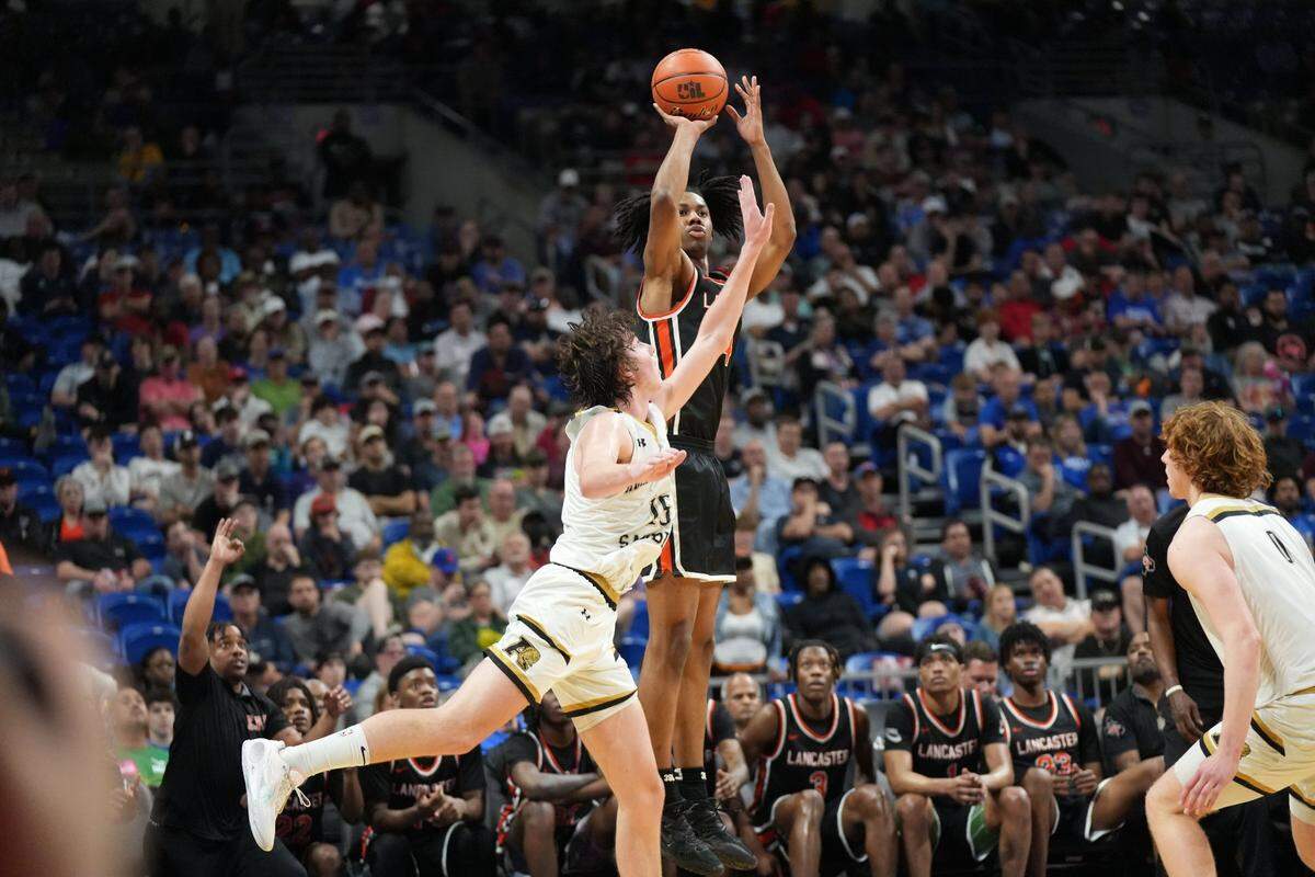 Lancaster’s Dillon Battie shoots over an Amarillo defender in a Class 5A state semifinal on Thursday, March 7, 2024 at the Alamodome in San Antonio, Texas. Lancaster defeated Amarillo 44-31.