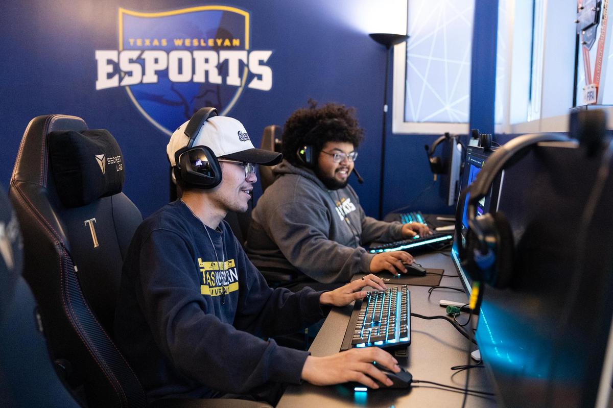 Senior Benjamin Domenzain, left, and sophomore Draylone Weathersby play PC games together in the Esports ‘Blue Room’ at the Jack and Jo Willa Morton Fitness Center on the Texas Wesleyan University campus.