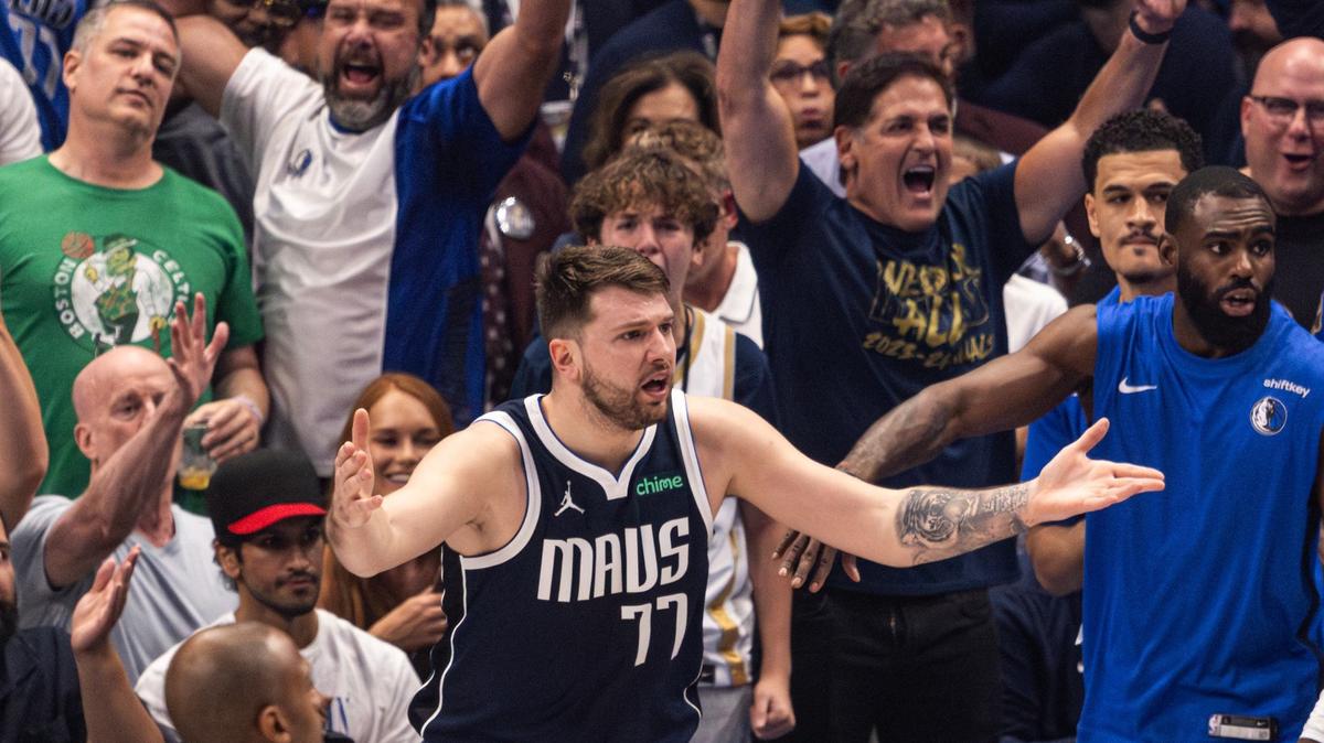 Dallas Mavericks guard Luka Doncic (77) reacts to a foul call in the first quarter of game 3 of the 2024 NBA Finals at American Airlines Center in Dallas on Wednesday, June 12, 2024.