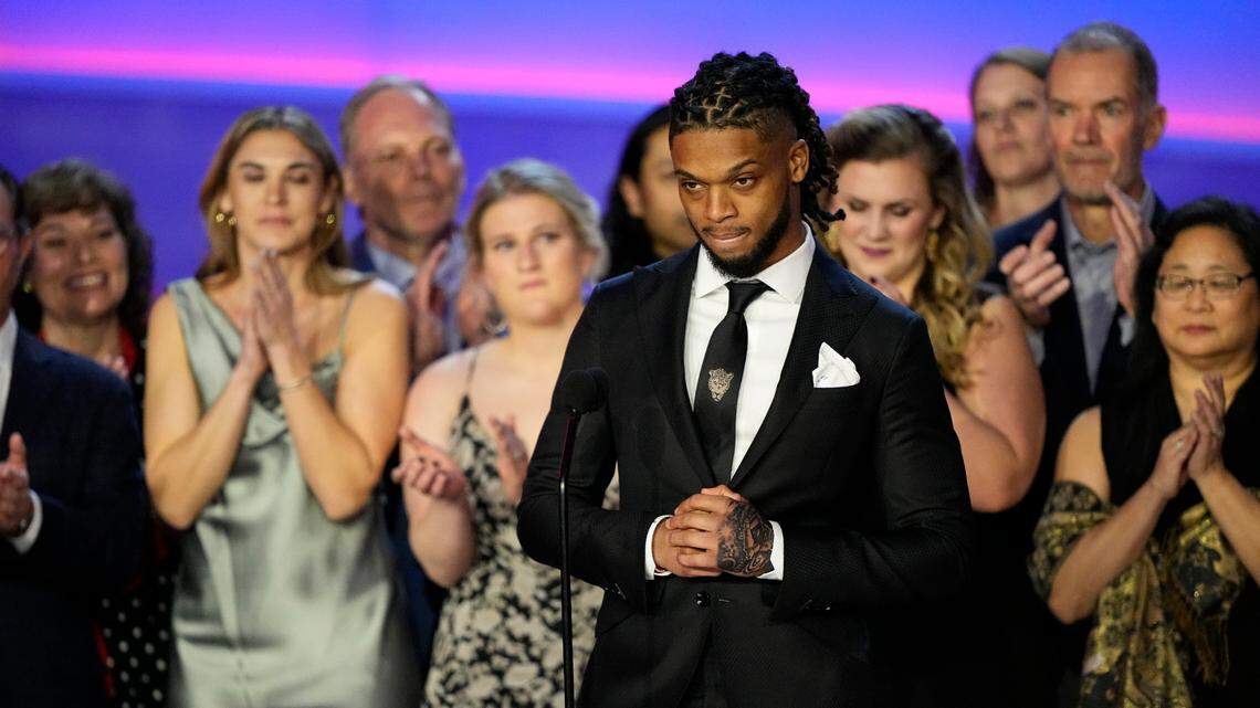 Damar Hamlin speaks in front of University of Cincinnati Medical Center staff during the NFL Honors award show ahead of the Super Bowl 57 football game,Thursday, Feb. 9, 2023, in Phoenix. (AP Photo/David J. Phillip)