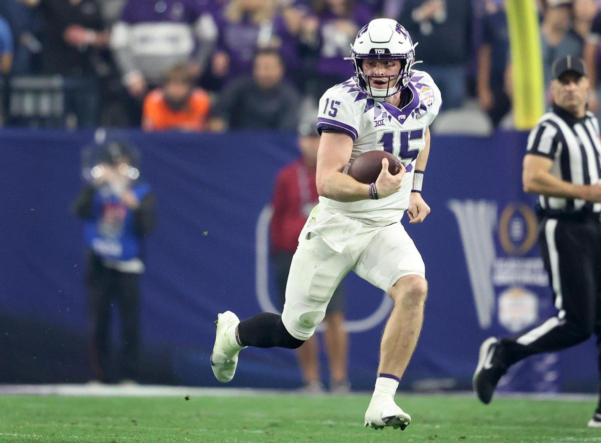 TCU quarterback Max Duggan runs the ball at the Vrbo Fiesta Bowl at State Farm Stadium in Glendale, Ariz., on Saturday, December 31, 2022.
