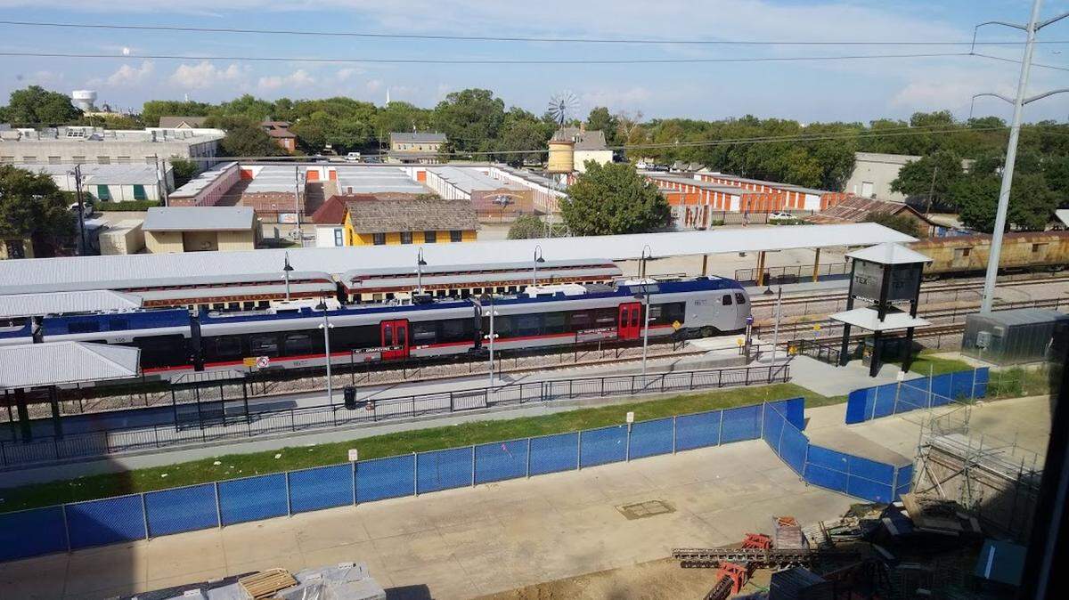 A TEXRail train arrives at the Grapevine Main Street station, next to where the new Hotel Vin + Harvest Hall is set to open in the summer of 2020.
