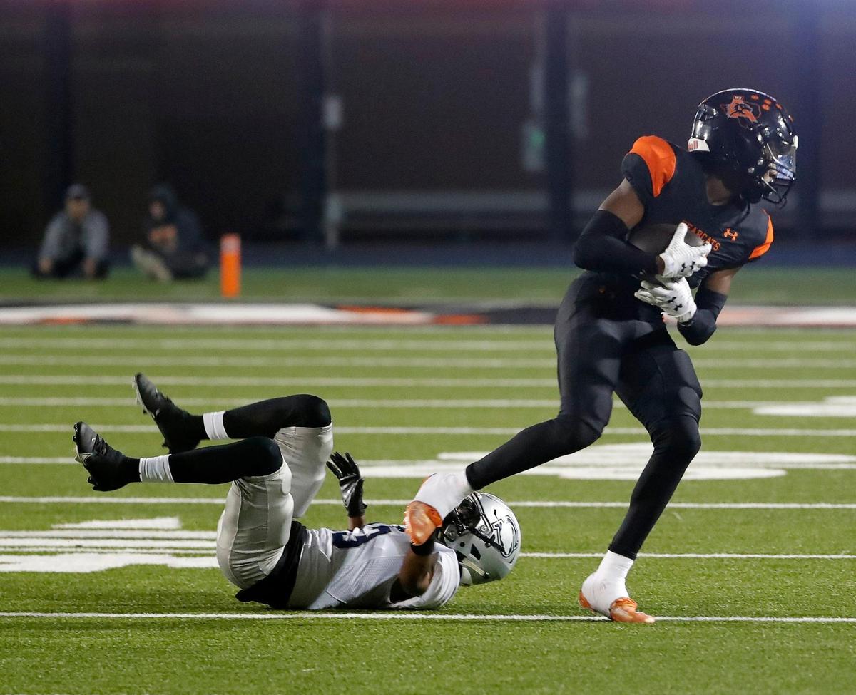 Aledo corner back Aven Lawrence (7) intercepts a pass intended for Shoemaker wide receiver Maurice Starr (13) in the first half of a Class 5A D1 bi-district football game between Killeen Shoemaker and Aledo at Bearcat Stadium in Aledo, Texas, Thursday, Nov. 10, 2022. Aledo led Shoemaker 28-0 at the half. (Special to the Star-Telegram Bob Booth)
