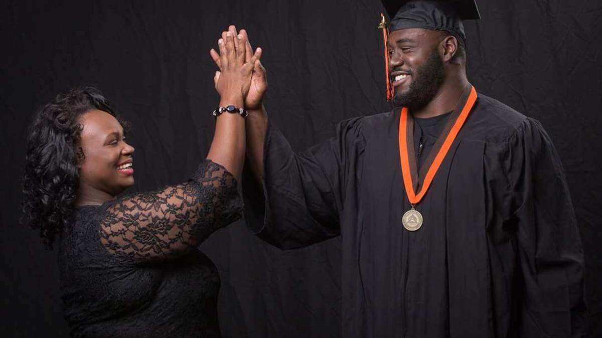 South Grand Prairie alum DeQuinton Osborne celebrates after earning his college degree from Oklahoma State in 2017 with his mother, Dorothy Osborne. He is now with the Dallas Cowboys hoping to make the team as a rookie free agent signee. She gave birth to her son when she was 13.