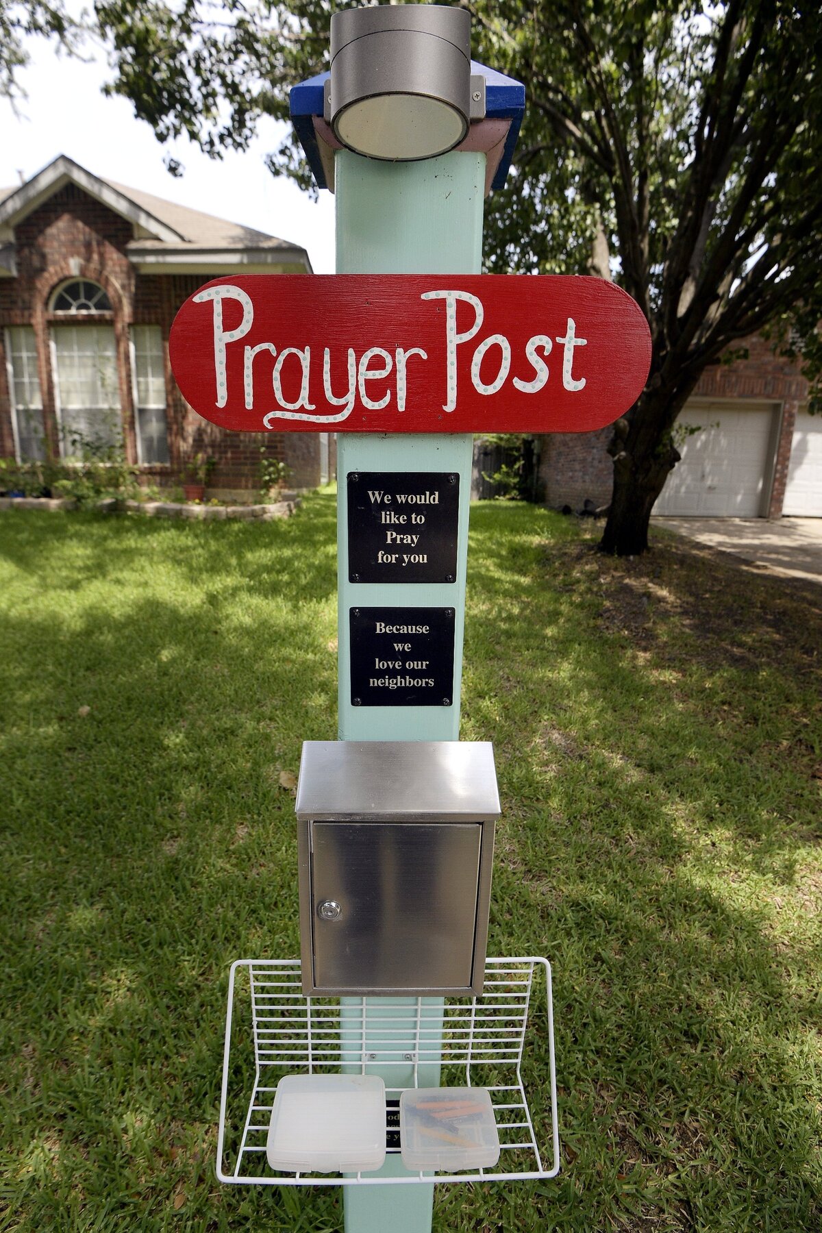 Jack Reiser's homemade Prayer Post at his home in Fort Worth.