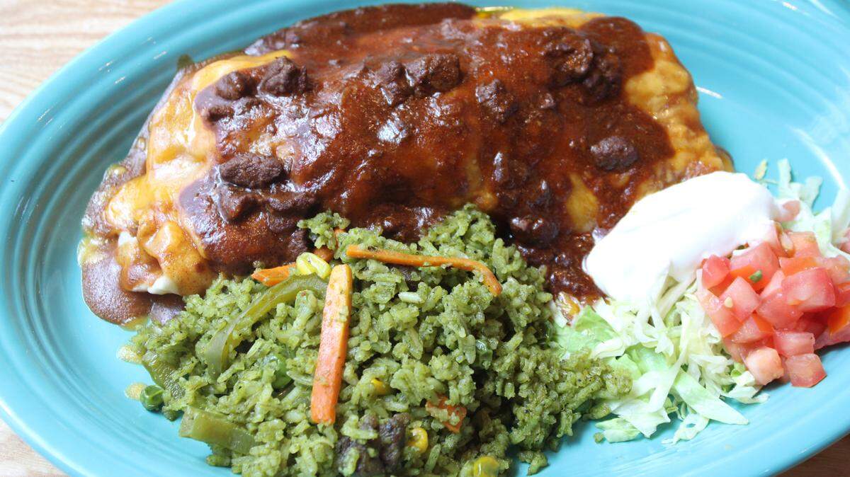 El Tiempo Cantina is now open at Choctaw Stadium in Arlington serving dishes like this enchilada.