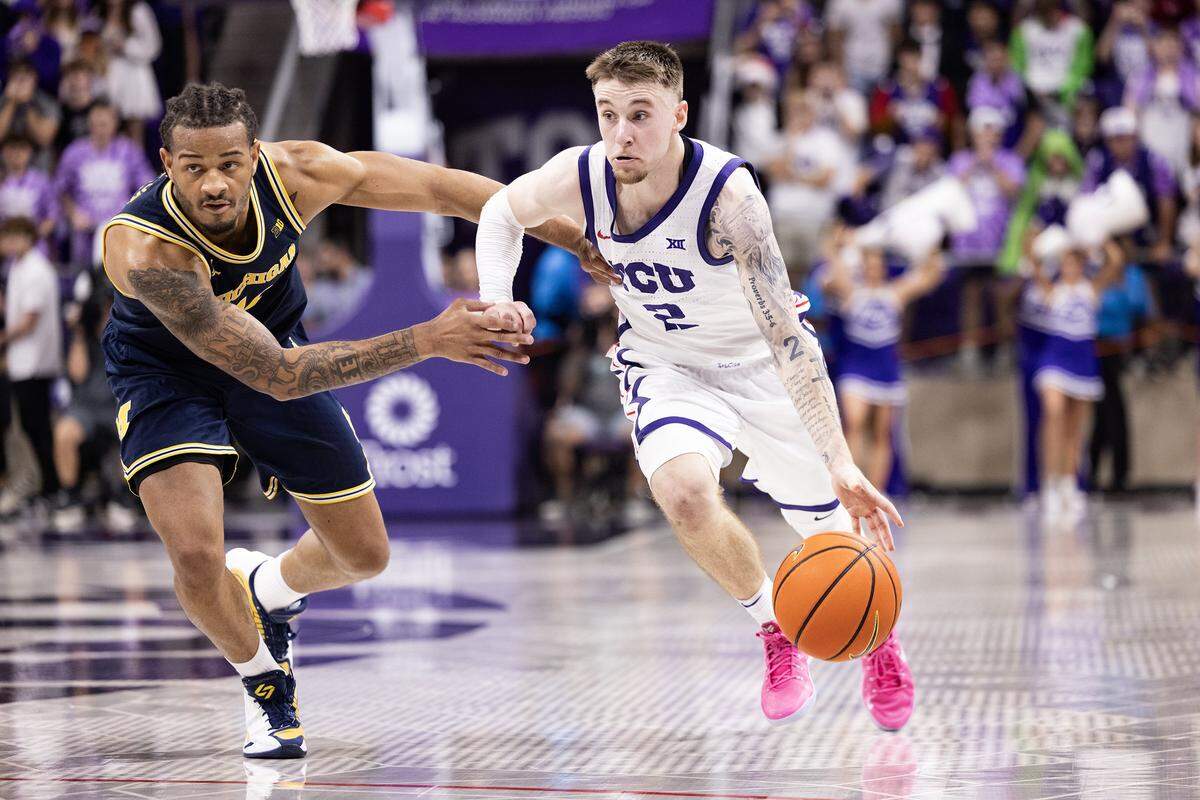 TCU guard Brock Harding (2) drives to the basket in the second half of a NCAA basketball game between the TCU Horned Frogs and the Michigan Wolverines at Schollmaier Arena in Fort Worth on Friday, Nov.14, 2025.