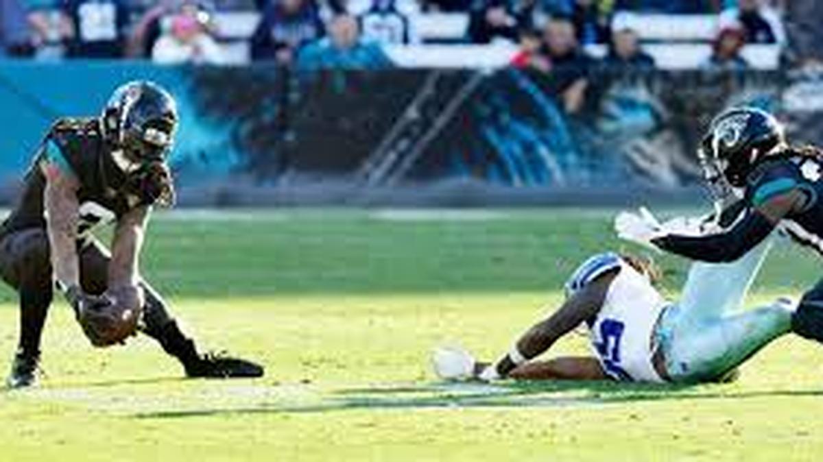 Dallas Cowboys wide receiver Noah Brown drops a pass from quarterback Dak Prescott that is intercepted by Jacksonville Jaguars safety Rayshawn Jenkins, who returned it 52 yards to the end zone to seal a 40-34 Jaguars victory.