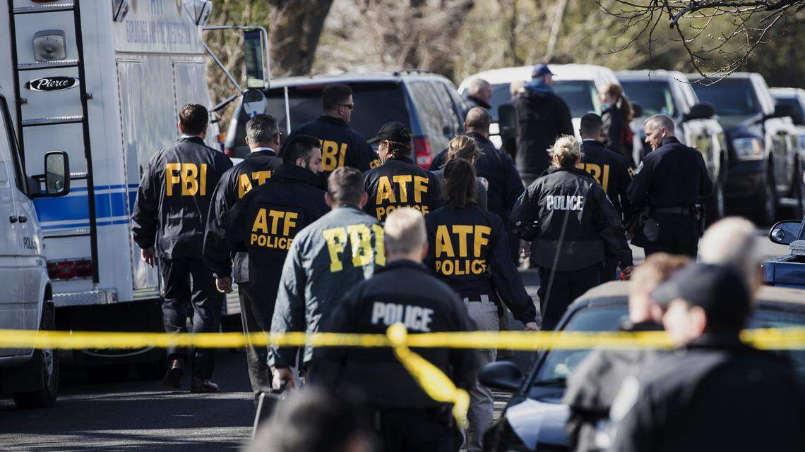 Authorities work on the scene after multiple explosions in Austin on Monday, March 12, 2018. Police are responding to another explosion Monday, that badly injured a woman, hours after a package bomb killed a teenager and wounded a woman in a different part of the city.