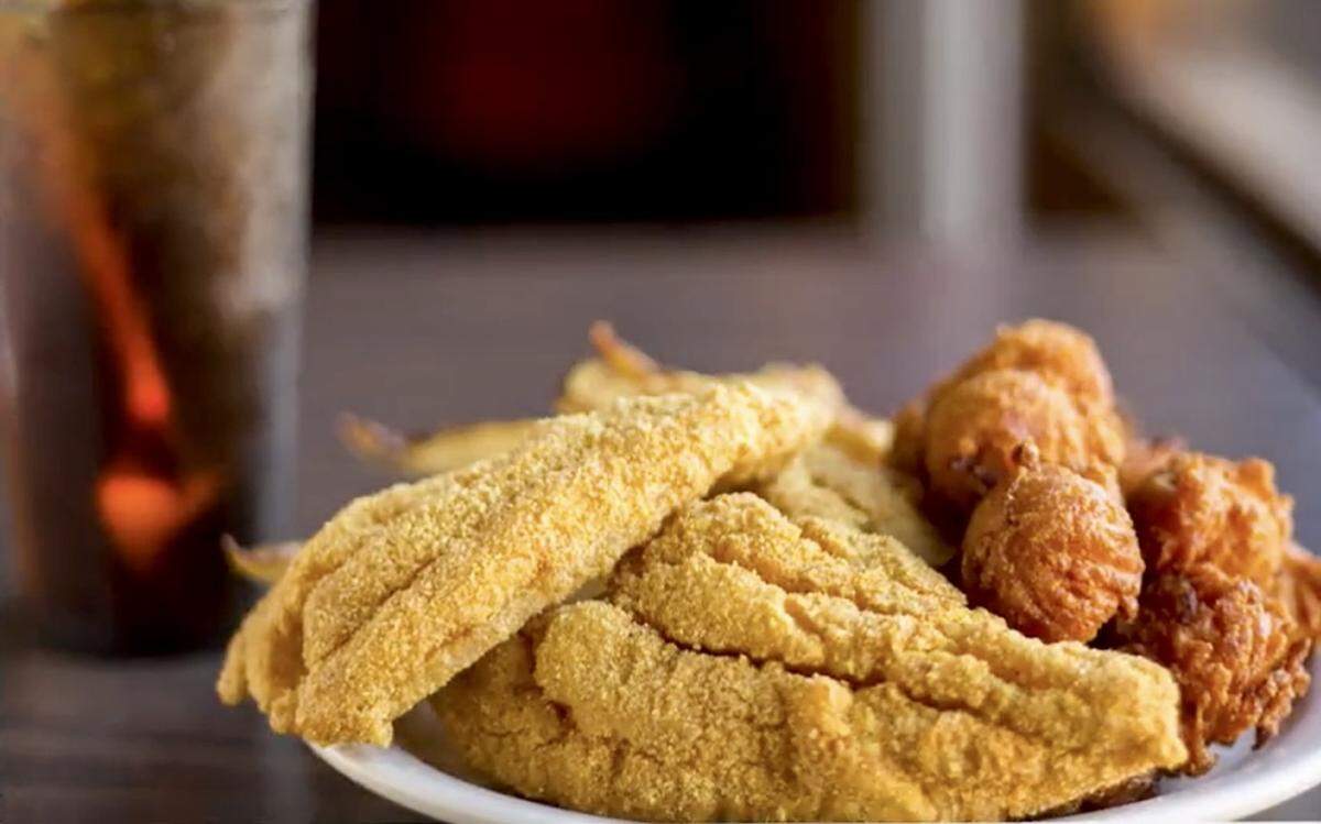 Catfish and homemade hush puppies at McGehee Catfish Restaurant on the Red River in Oklahoma.
