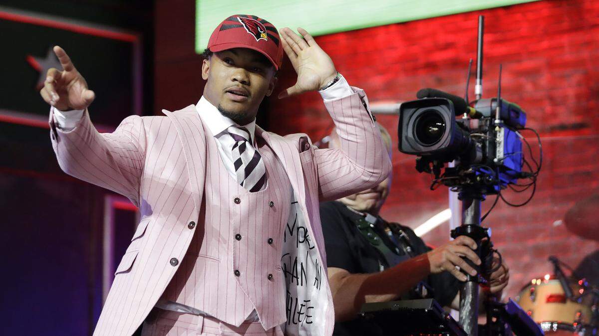Oklahoma quarterback Kyler Murray waves after the Arizona Cardinals selected with the No. 1 overall pick in the NFL football draft, Thursday in Nashville.