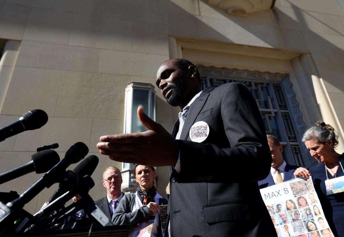 Paul Njoroge, who lost multiple family members in a plane crash involving a Boeing 737 MAX, speaks to the media following an arraignment at the federal courthouse in Fort Worth on Thursday, January 26, 2023, at the federal court in Fort Worth. He and other family members attended an arraignment challenging the plea agreement Boeing made with the Justice Department that granted them immunity from criminal prosecution.