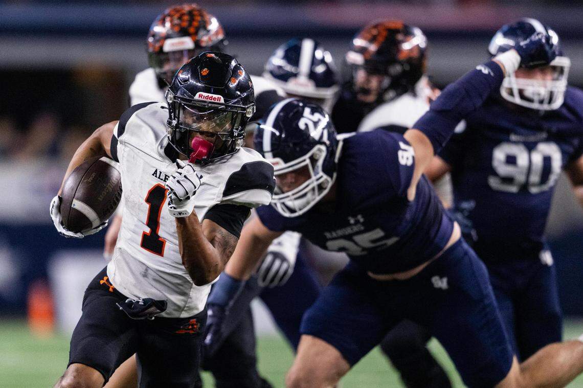 Aledo running back Hawk Patrick-Daniels (1) runs the ball in for a touchdown in the first quarter of the Class 5A Division I football state championship game against Smithson Valley at AT&T Stadium in Arlington on Friday, Dec. 15, 2023.