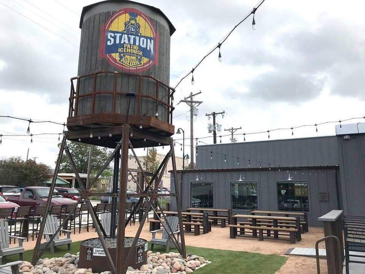 A water tower on the patio quickly establishes a landmark for Station Patio Icehouse, which opened in October in Keller
