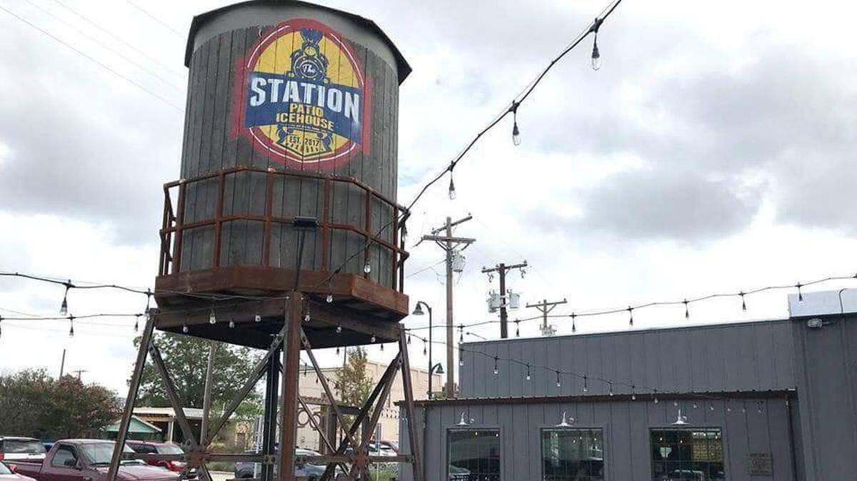A water tower on the patio quickly establishes a landmark for Station Patio Icehouse, which opened in October in Keller