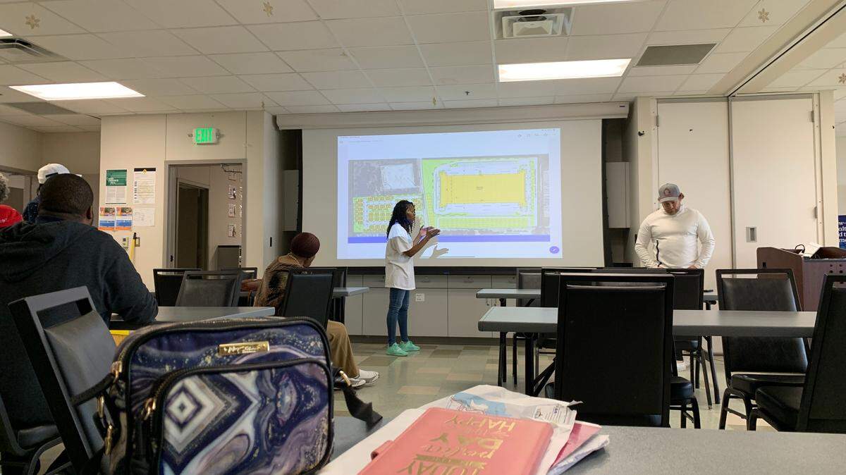 Letitia Wilbourn, a leader of the Echo Heights and Stop Six Environmental Coalition, explains her objections to a proposed residential and industrial development along Parker Henderson road during a meeting with a developer Feb. 24.