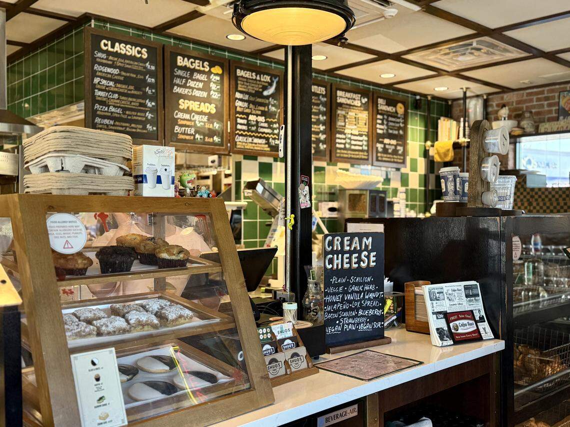 The Shug’s Bagels location on Lemmon Avenue in Dallas is a small converted sandwich shop with a busy, urban look, seen Nov. 7, 2025.