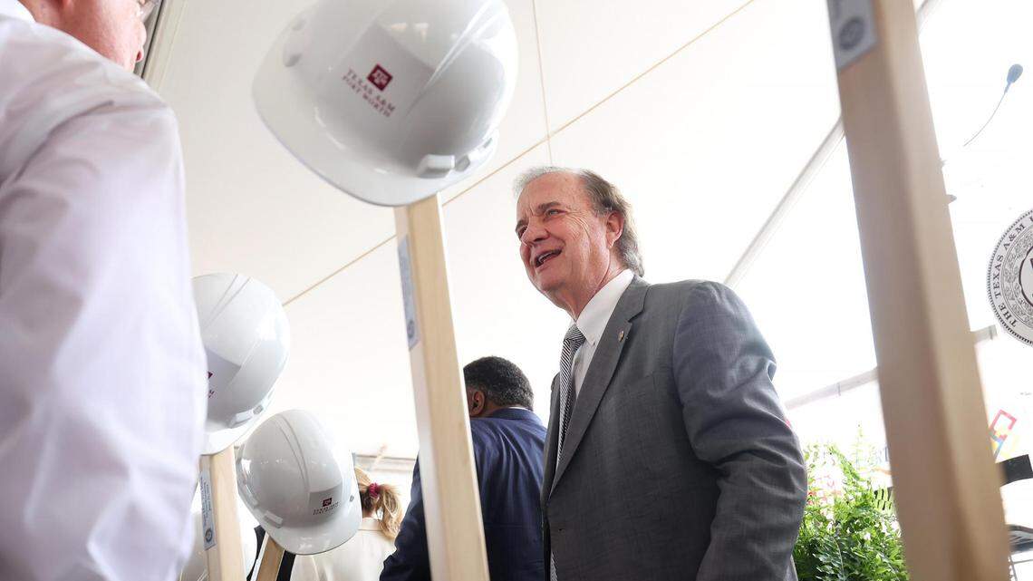 John Sharp, chancellor of the Texas A&M University System, talks with guests following the ground breaking for Texas A&M-Fort Worth’s first building of the new planned downtown campus on Wednesday, June 21, 2023.