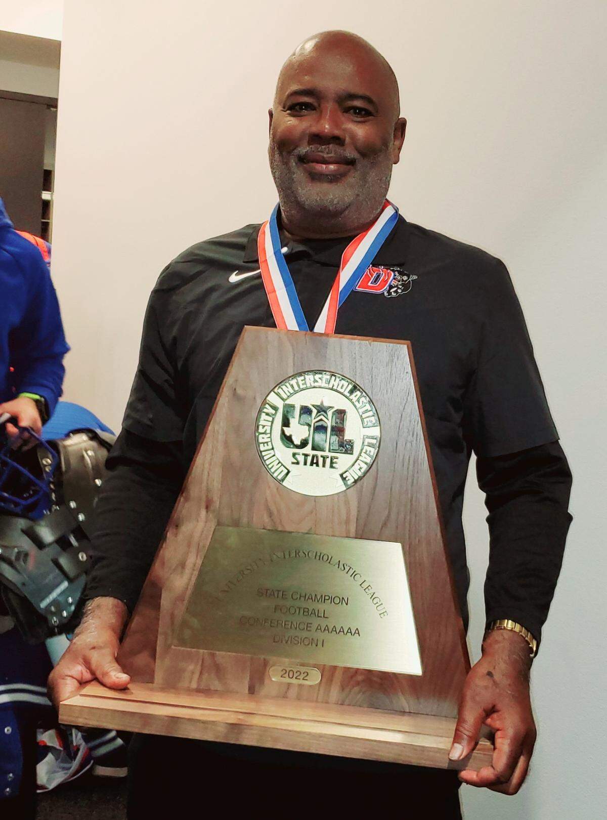 Duncanville head coach Reginald Samples won the 6A D1 state championship on Saturday Dec. 17, 2022 at AT&T Stadium after the Panthers beat North Shore 28-21. 