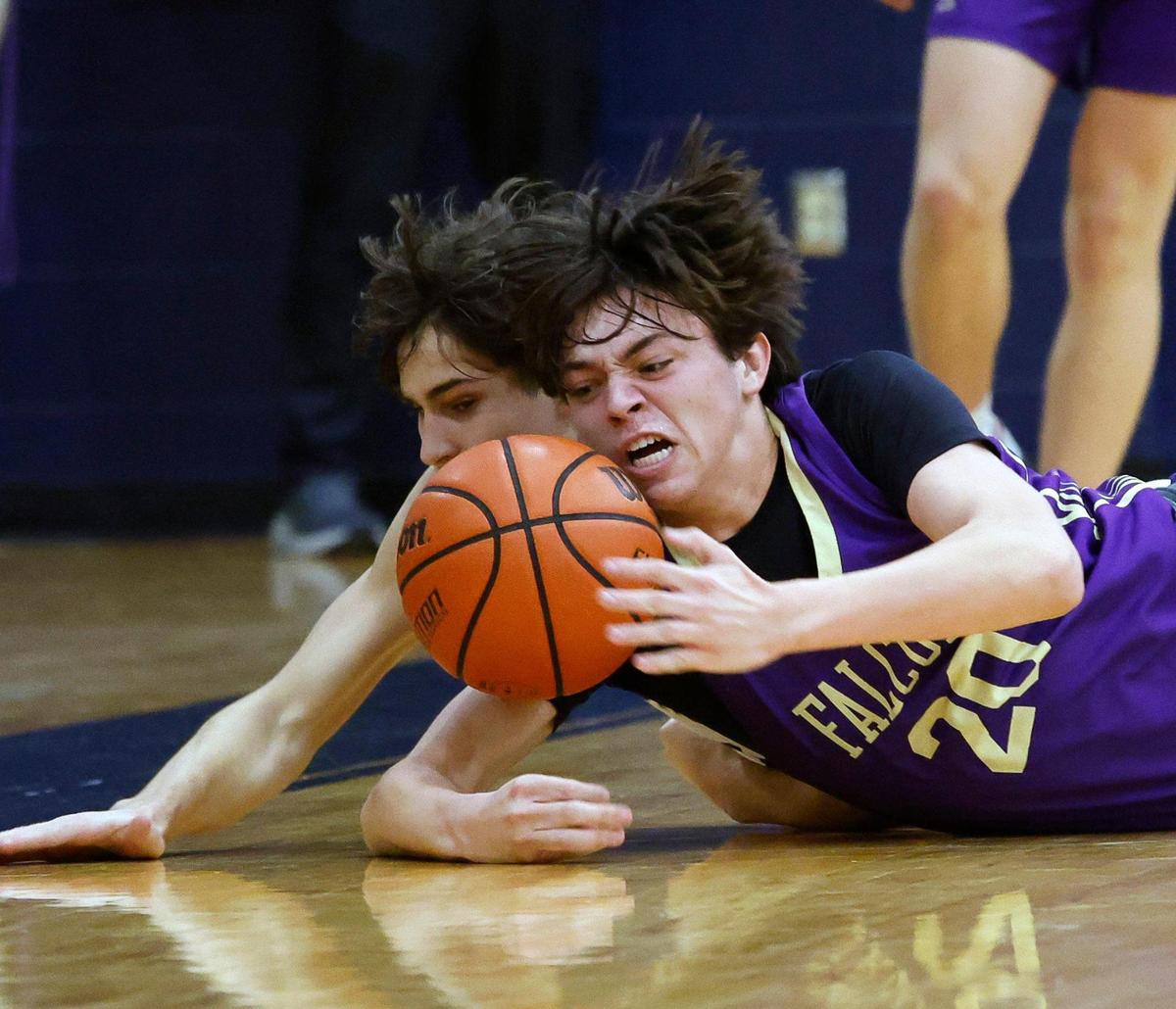 Timber Creek forward Colton Thorpe (20) battles for a loose ball in the first period of a high school basketball game in the Keller High School gym in Keller Texas, Friday, Feb. 02, 2024.