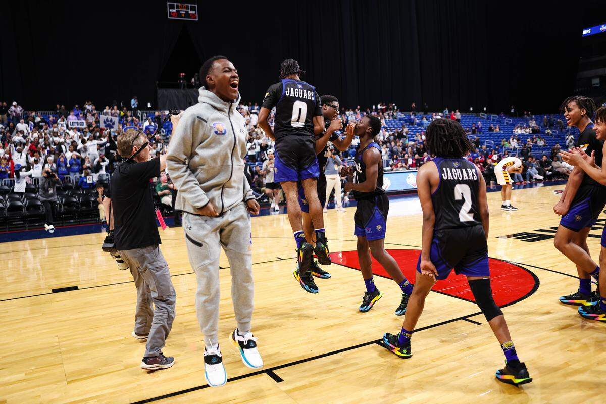 Mansfield Summit players jump in the air in celebration after winning their second straight championship after the Class 5A Division II state championship against Beaumont United at The Alamodome in San Antonio, Texas, March 14, 2026.