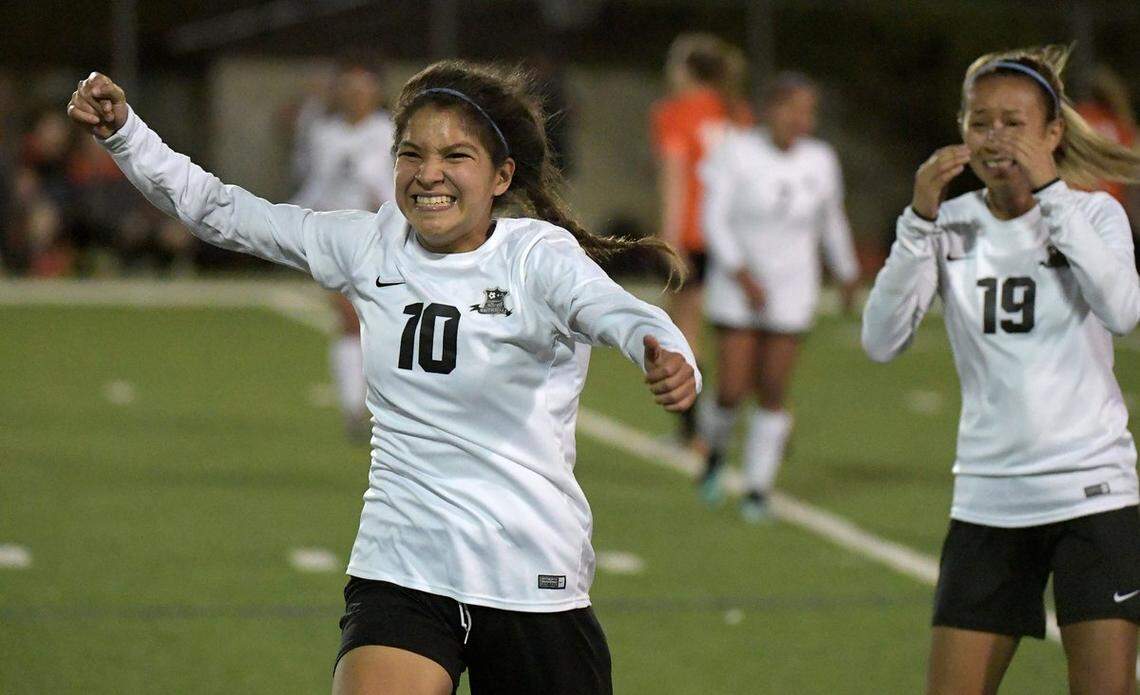 FW South Hills sophomore Johana Rodriguez (10) and senior Karen Sarellano celebrate the Scorpions 2-0 victory over Aledo in the 5A Region I area round at South HIlls HS, April 3, 2018. The Scorpions are headed to the regional quarterfinals for the first time.