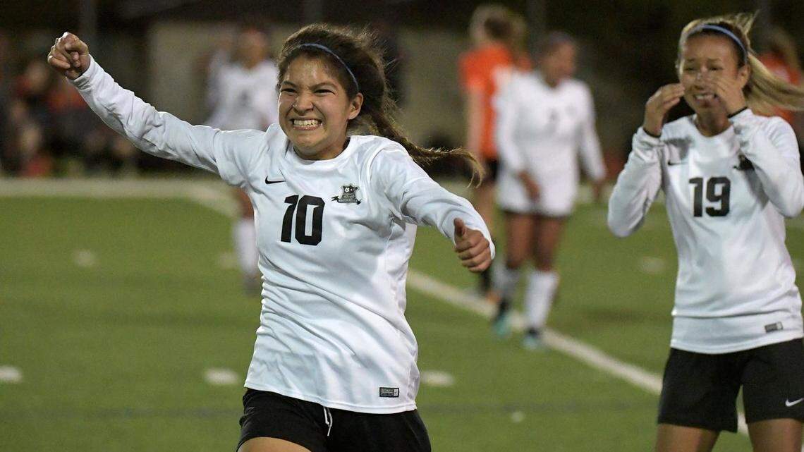 FW South Hills sophomore Johana Rodriguez (10) and senior Karen Sarellano celebrate the Scorpions 2-0 victory over Aledo in the 5A Region I area round at South HIlls HS, April 3, 2018. The Scorpions are headed to the regional quarterfinals for the first time.
