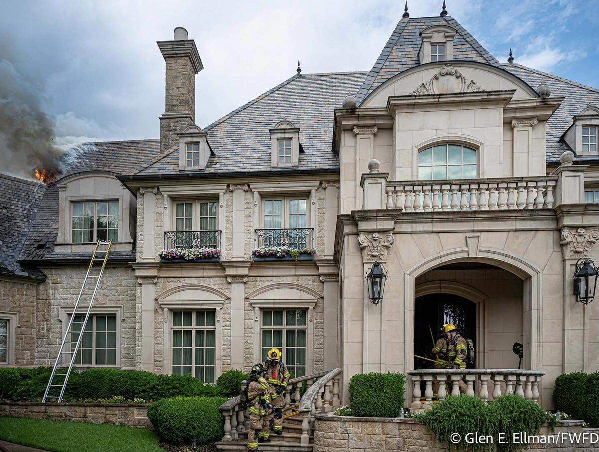A large mansion-style home near Benbrook Lake caught fire Wednesday morning, May 28, after a possible lightning strike.