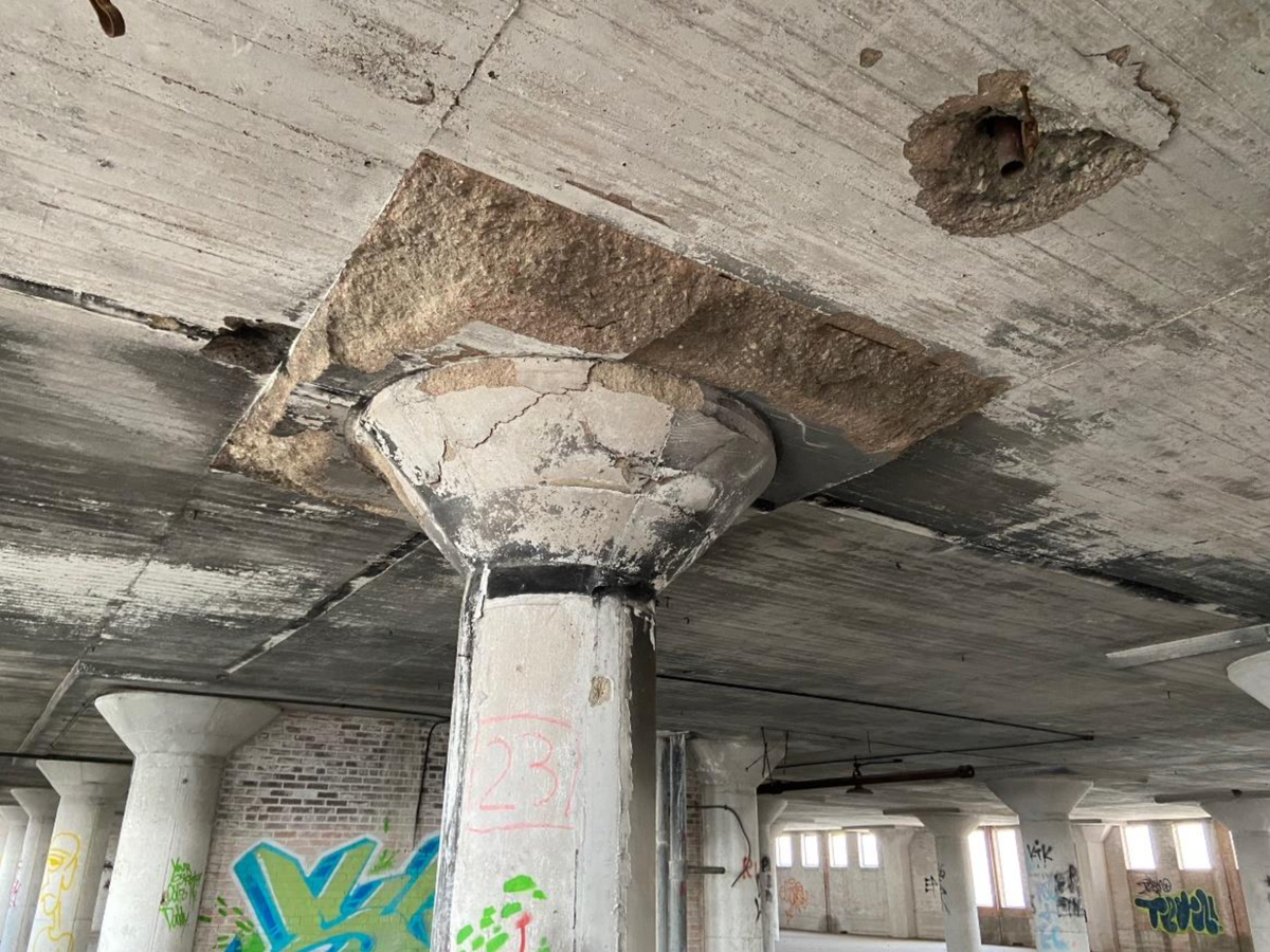 A column inside the T&P Warehouse displays broken concrete, a common condition in several columns on the fourth floor, FWNA’s report said.
